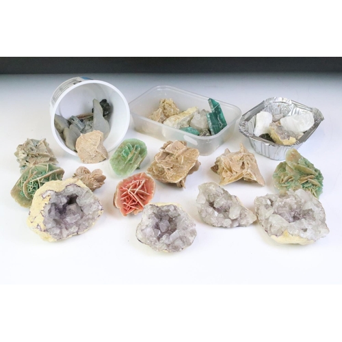 276 - A large collection of crystal and rock specimens to include amethyst and malachite examples.