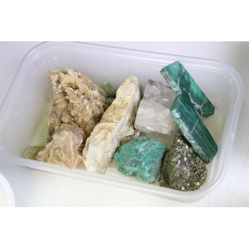 276 - A large collection of crystal and rock specimens to include amethyst and malachite examples.