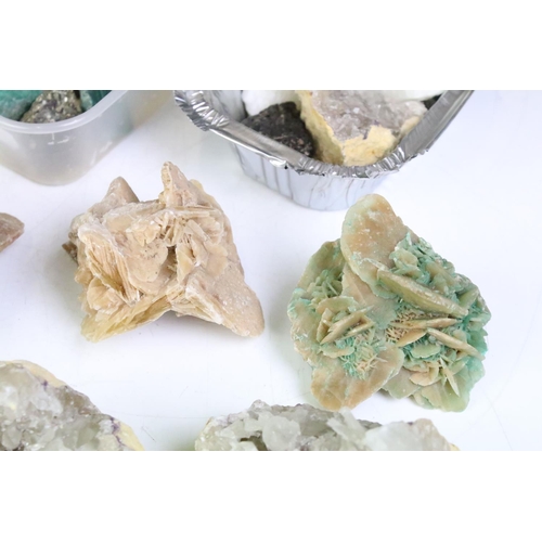 276 - A large collection of crystal and rock specimens to include amethyst and malachite examples.