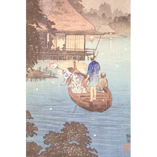 458 - Shotei Takahashi (1871 - 1947), a framed Japanese woodblock scene, figures in boat with shoreline dw... 