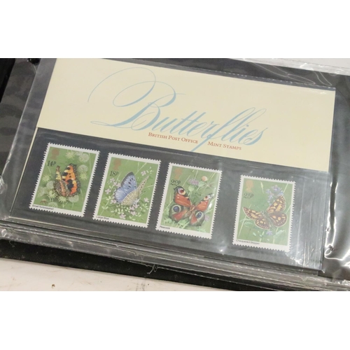 325 - Collection of stamps within five albums, featuring mint examples, to include 2 x Stanley Gibbons The... 