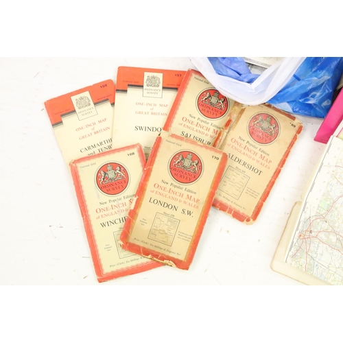 331 - A large collection of mainly paper folding ordnance survey maps to include some early examples.