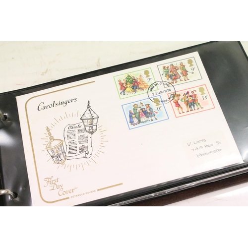 332 - Four albums of assorted late 20th Century first day covers, together with an album of stamps includi... 