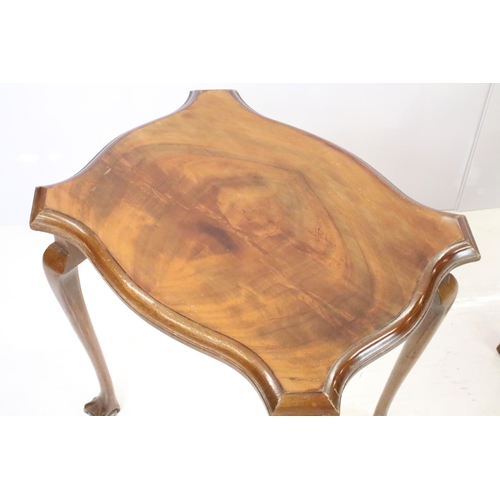 526 - Nest of three mahogany tables on ball and claw feet, the largest - 51cm high x 55cm wide x 41cm deep