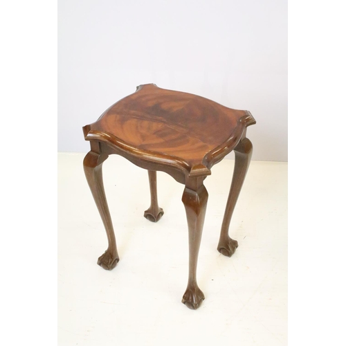 526 - Nest of three mahogany tables on ball and claw feet, the largest - 51cm high x 55cm wide x 41cm deep