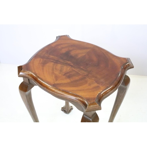 526 - Nest of three mahogany tables on ball and claw feet, the largest - 51cm high x 55cm wide x 41cm deep