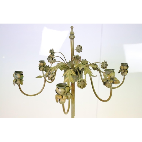 552 - 20th century gilt metal six-branch candle stand, modelled with leaves and flowers, 136cm high