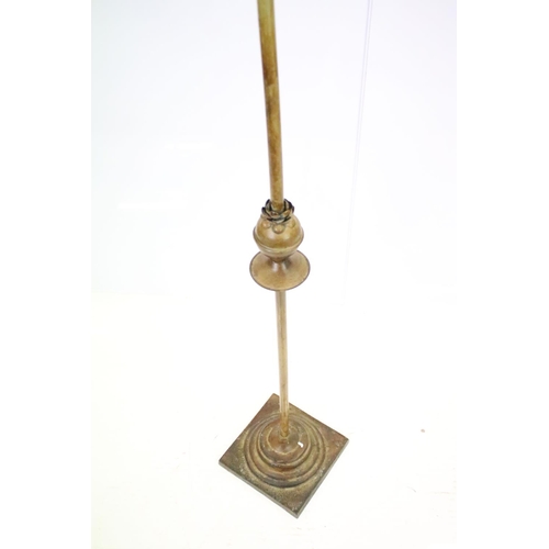 552 - 20th century gilt metal six-branch candle stand, modelled with leaves and flowers, 136cm high