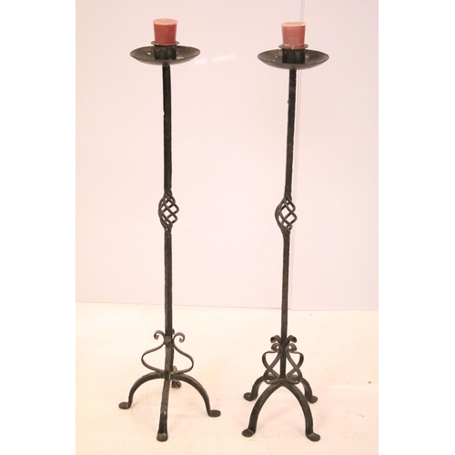 553 - Eastern substantial carved hardwood tapering candlestick, 64.5cm high, diameter 12cm together with a... 