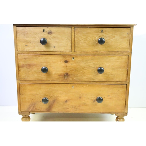 545 - Victorian pine cottage chest of two short and two long drawers on turned legs, 83cm high x 85cm wide... 