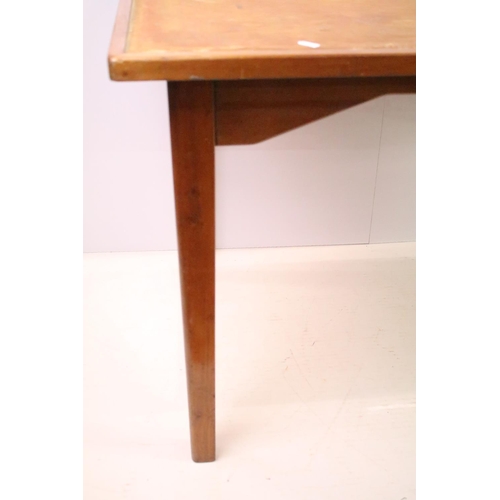 548 - Mid century mahogany table on square tapering legs, paper label below for B.C & S. Ltd, London (lack... 