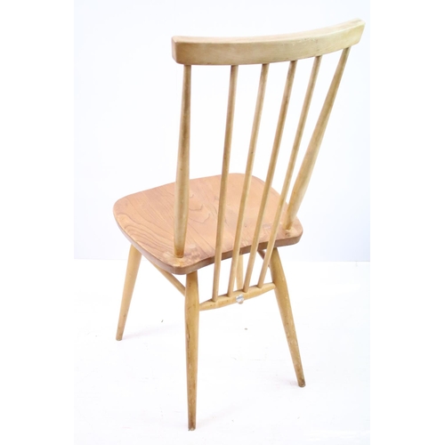 549 - Set of four Ercol blonde elm and beech stickback chairs, model 608, two with partial maker's labels,... 