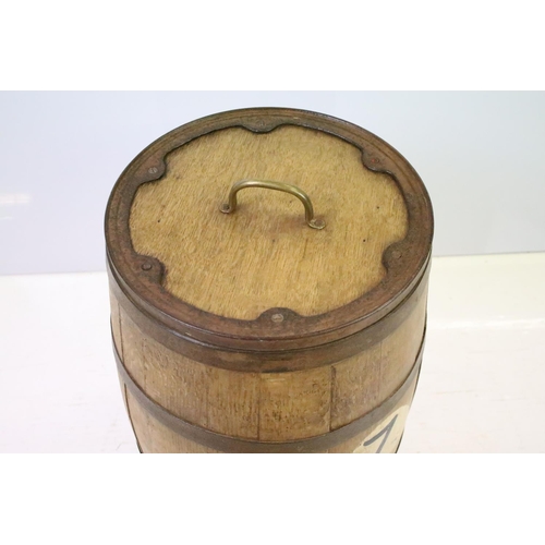 551 - Victorian oak and iron bound barrel with lidded top, 57.5cm high, 38cm diameter (top)