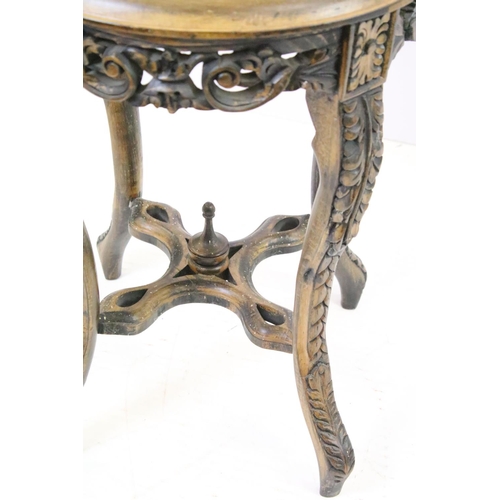 585A - Carved hardwood jardiniere stand with x-frame stretcher, with circular marble top, 53cm high x 39cm ... 