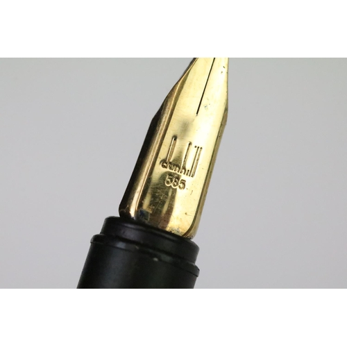 202A - A vintage Dunhill gold plated fountain pen with 14ct gold nib, Alfred Dunhill logo stamped to pin li... 