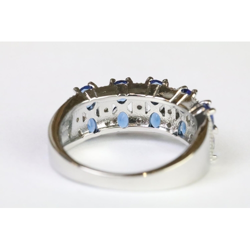 219A - A 925 sterling silver ladies dress ring in the Art Deco style set with blue and clear stones, marked... 