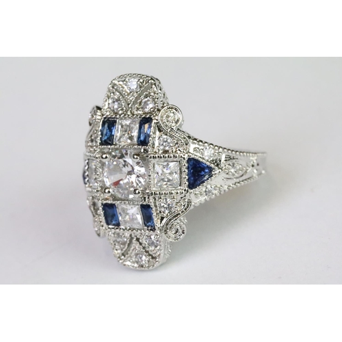 239A - A 925 sterling silver ladies dress ring in the Art Deco style set with blue and clear stones, marked... 