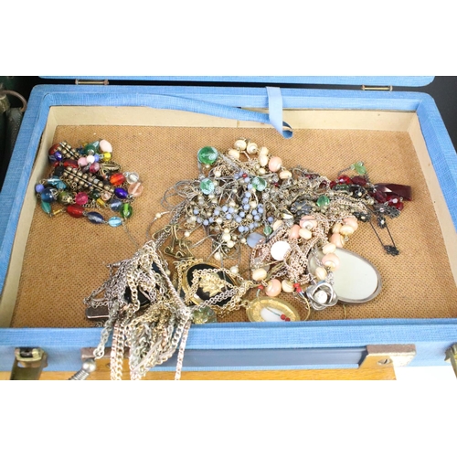 280 - A large collection of mixed costume jewellery contained within 5 boxes.