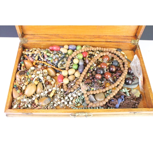 280 - A large collection of mixed costume jewellery contained within 5 boxes.