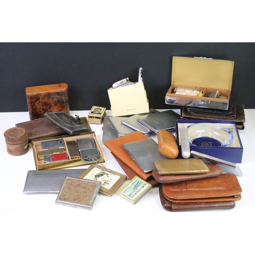 291 - A group of smoking related collectables to include cigarette cases, leather cigar cases, lighters, m... 