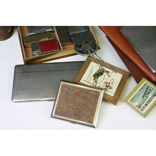 291 - A group of smoking related collectables to include cigarette cases, leather cigar cases, lighters, m... 