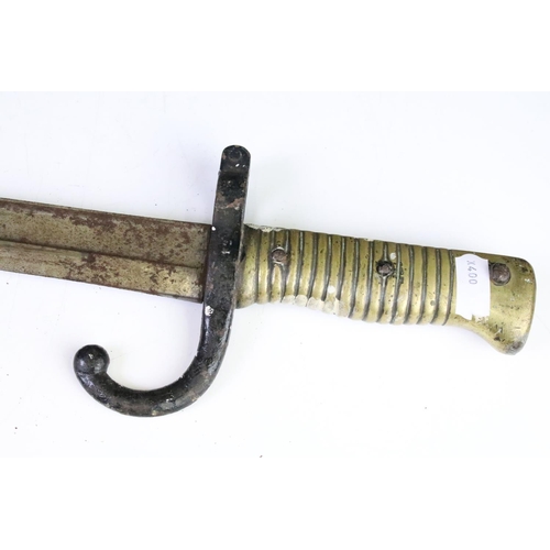 295 - A French World War One sword bayonet complete with scabbard.