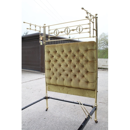 594 - Ornate brass bed frame, the headboard with swing frame side panels, 229cm high x 132cm wide with mus... 