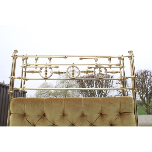 594 - Ornate brass bed frame, the headboard with swing frame side panels, 229cm high x 132cm wide with mus... 