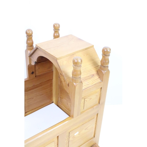 596 - Panelled pine rocking crib, 69cm high x 57cm wide x 79.5cm long