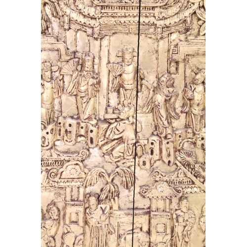 124 - Oriental carved gilt wooden panel with figures in traditional dress, framed, approx 47cm x 35cm