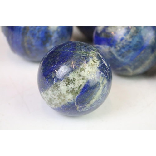 301 - A collection of six polished Lapis Lazuli balls.