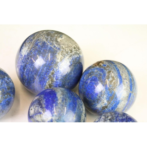 301 - A collection of six polished Lapis Lazuli balls.