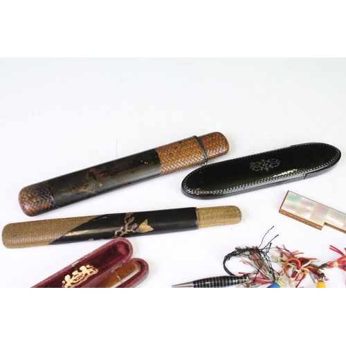 303 - A small group of mixed collectables to include bridge pens, lacquer ware spectacles case, cheroot ho... 