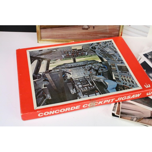 307 - A small group of aviation collectables to include Concorde tie pin, framed space shuttle photograph,... 