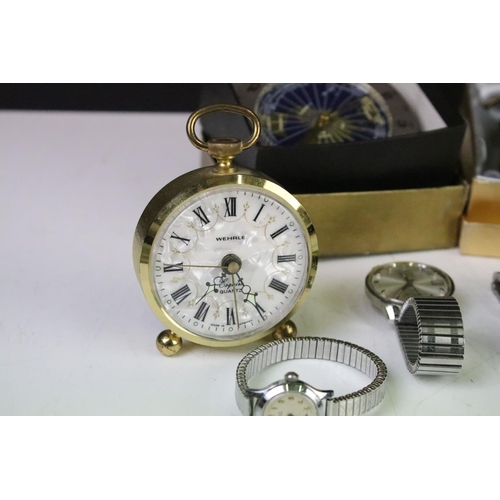 314 - A small group of collectables to include ladies and gents wristwatches, desk top clock, miniature mi... 