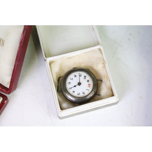 315 - A small group of mixed collectables to include sterling silver watch fobs, medals, badges, penknife ... 