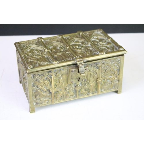 318 - A brass casket box with apostle decoration by Adolph Frankau, makers mark to base.