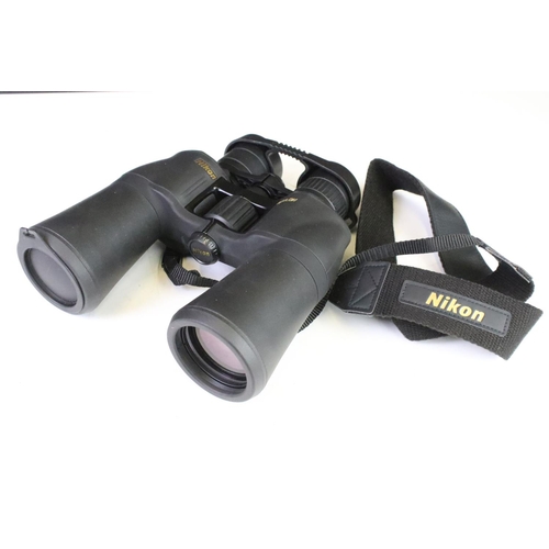 321 - A set of Nikon Aculon A211 10-22x50 binoculars with original case and box.