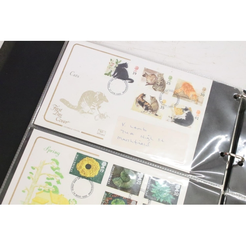 333 - Four albums of assorted late 20th Century first day covers together with a collection of stamps incl... 