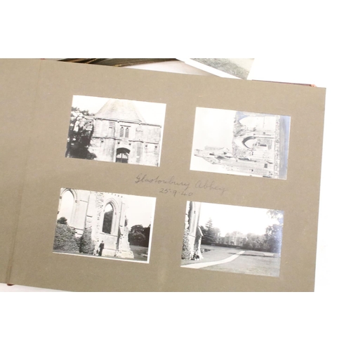 346 - A collection of vintage photograph albums complete with contents and together with loose examples to... 