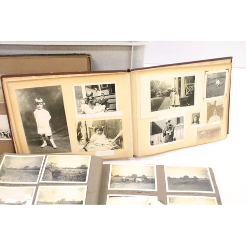 346 - A collection of vintage photograph albums complete with contents and together with loose examples to... 