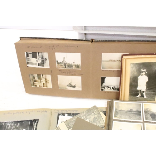 346 - A collection of vintage photograph albums complete with contents and together with loose examples to... 