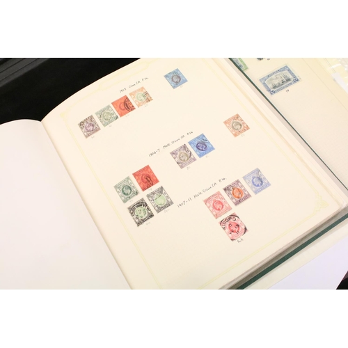 349 - A collection of British, Commonwealth and world stamps within albums together with loose examples to... 