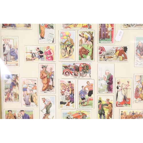 350 - A collection of cigarette cards to include loose and framed examples to include Players, Gallaher an... 