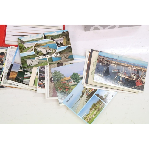 354 - A large collection of early to mid 20th century postcards to include military, silk, topographical, ... 