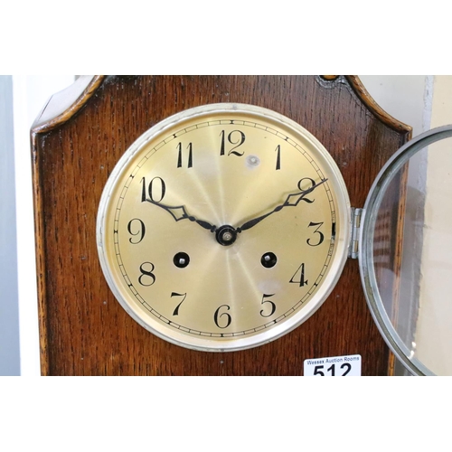 512 - Early 20th century oak grandmother clock, the dial with Arabic numerals, the case with scrolled deta... 