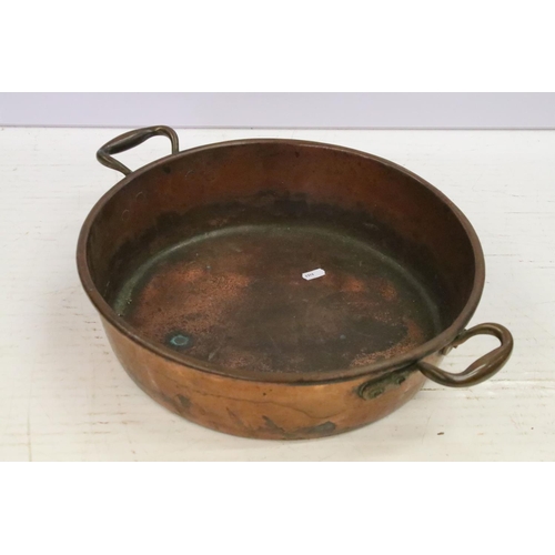 413 - Large copper shallow pan, with two brass handles, 12cm high (excluding handles), 41cm diameter (excl... 