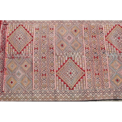 550A - Middle Eastern runner with all over geometric design, 304cm long x 83cm wide