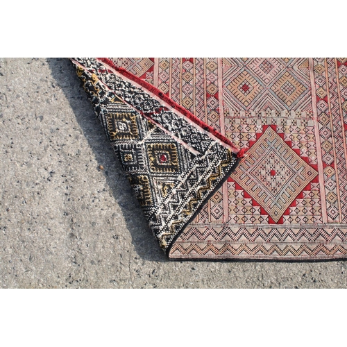 550A - Middle Eastern runner with all over geometric design, 304cm long x 83cm wide