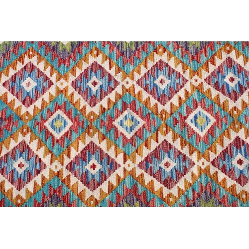 560A - Hand knotted woollen Chobi Kilim rug, 150cm long x 100cm wide